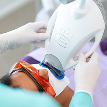 A patient getting their teeth whitened with Zoom!