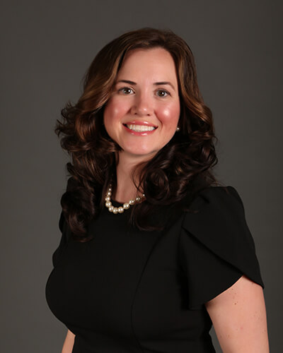 Your friendly neighborhood Troy dentist Headshot of Dr. Dawn Mann